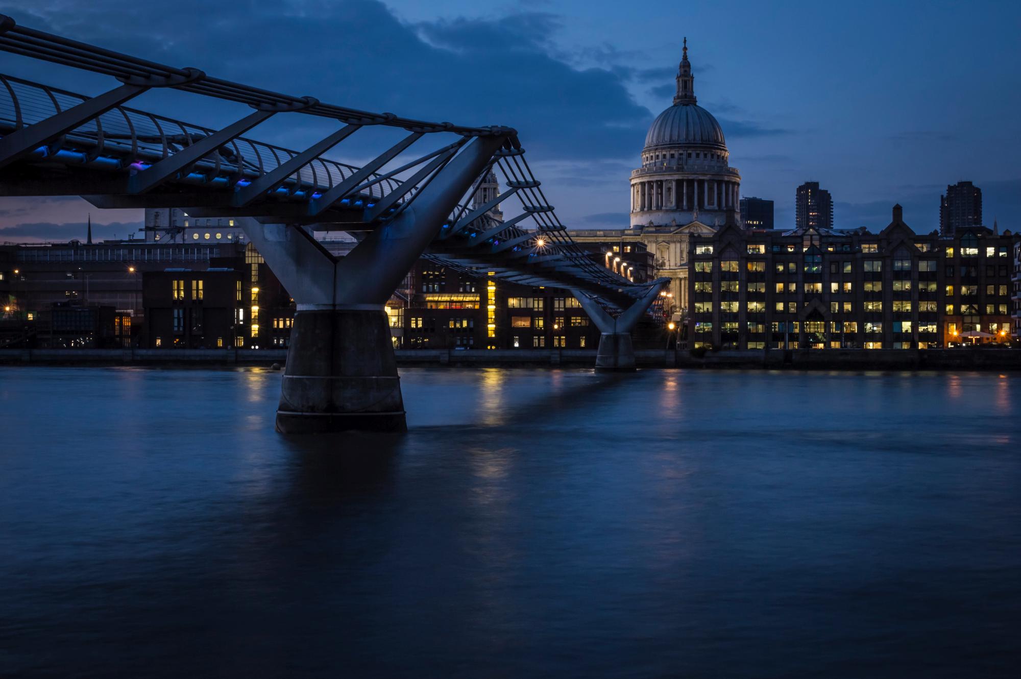The Millennium Bridge and St Paul’s Cathedral at dusk, London